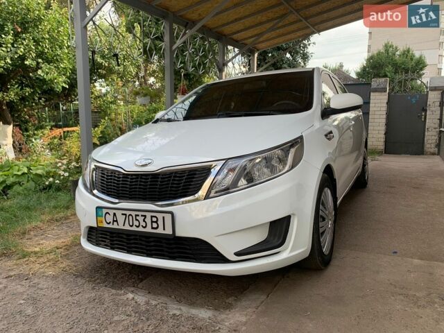 Белый Киа Рио, объемом двигателя 1.4 л и пробегом 195 тыс. км за 7500 $, фото 1 на Automoto.ua