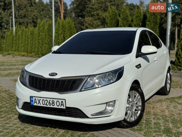 Білий Кіа Ріо, об'ємом двигуна 1.4 л та пробігом 185 тис. км за 6999 $, фото 1 на Automoto.ua
