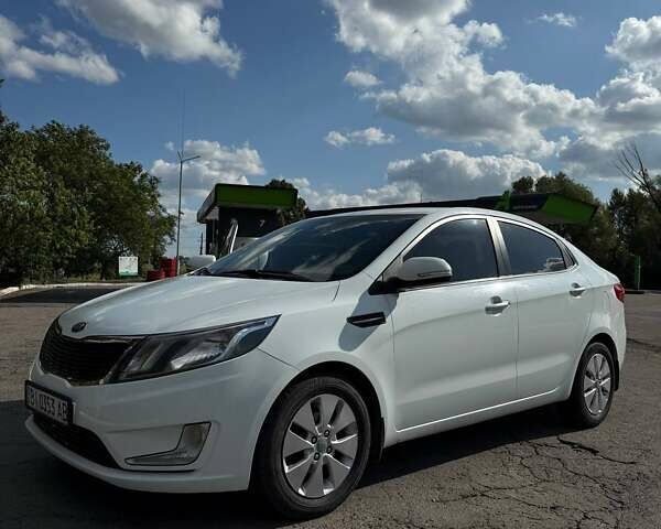Білий Кіа Ріо, об'ємом двигуна 1.59 л та пробігом 106 тис. км за 8400 $, фото 1 на Automoto.ua