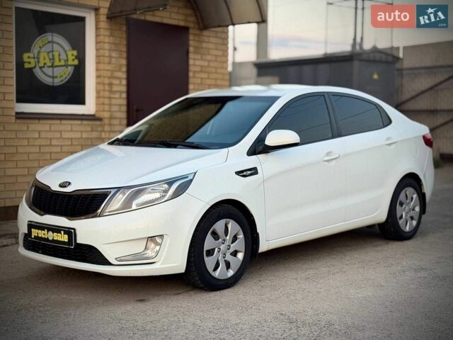 Белый Киа Рио, объемом двигателя 1.4 л и пробегом 73 тыс. км за 7950 $, фото 1 на Automoto.ua