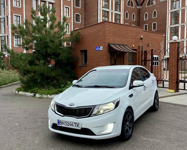 Белый Киа Рио, объемом двигателя 1.6 л и пробегом 94 тыс. км за 9200 $, фото 1 на Automoto.ua