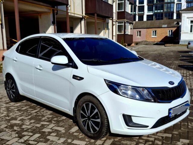 Белый Киа Рио, объемом двигателя 1.4 л и пробегом 87 тыс. км за 8750 $, фото 1 на Automoto.ua