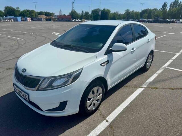 Белый Киа Рио, объемом двигателя 1.4 л и пробегом 179 тыс. км за 7610 $, фото 1 на Automoto.ua