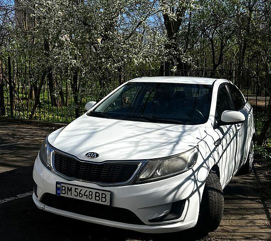 Белый Киа Рио, объемом двигателя 1.4 л и пробегом 176 тыс. км за 8000 $, фото 1 на Automoto.ua