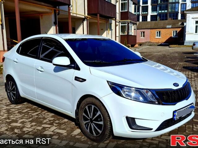 Білий Кіа Ріо, об'ємом двигуна 1.4 л та пробігом 87 тис. км за 8750 $, фото 1 на Automoto.ua