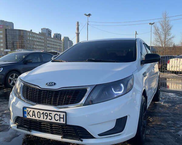 Білий Кіа Ріо, об'ємом двигуна 1.4 л та пробігом 248 тис. км за 7499 $, фото 1 на Automoto.ua