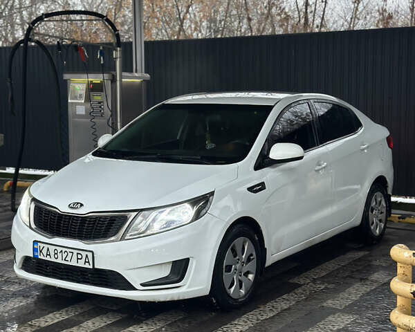 Білий Кіа Ріо, об'ємом двигуна 1.4 л та пробігом 187 тис. км за 6999 $, фото 1 на Automoto.ua