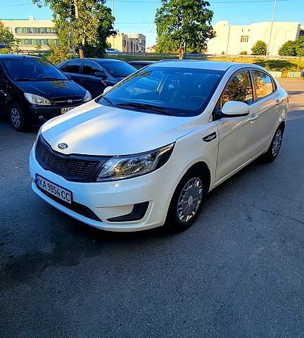 Білий Кіа Ріо, об'ємом двигуна 1.4 л та пробігом 232 тис. км за 7450 $, фото 1 на Automoto.ua