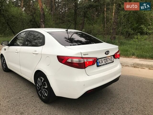 Белый Киа Рио, объемом двигателя 1.4 л и пробегом 198 тыс. км за 6750 $, фото 1 на Automoto.ua