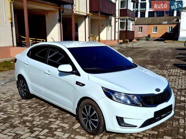 Белый Киа Рио, объемом двигателя 1.4 л и пробегом 87 тыс. км за 8750 $, фото 1 на Automoto.ua