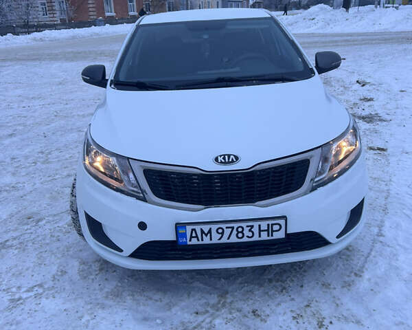 Белый Киа Рио, объемом двигателя 1.4 л и пробегом 130 тыс. км за 6900 $, фото 1 на Automoto.ua