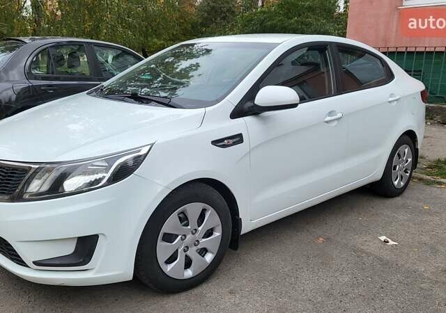 Белый Киа Рио, объемом двигателя 1.4 л и пробегом 153 тыс. км за 8300 $, фото 1 на Automoto.ua