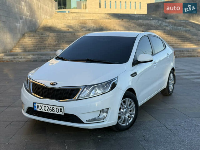 Белый Киа Рио, объемом двигателя 1.4 л и пробегом 185 тыс. км за 6700 $, фото 1 на Automoto.ua