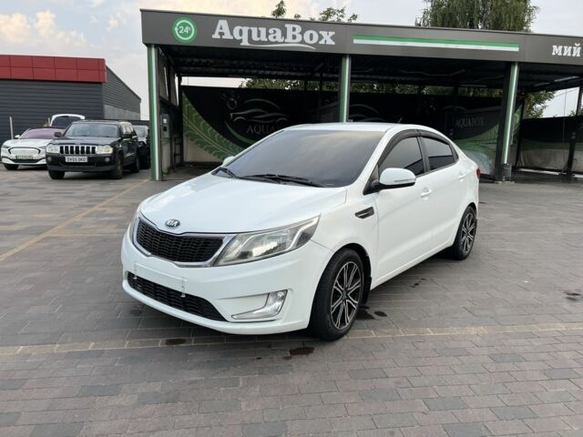 Белый Киа Рио, объемом двигателя 1.6 л и пробегом 243 тыс. км за 5735 $, фото 1 на Automoto.ua
