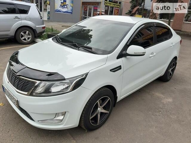 Белый Киа Рио, объемом двигателя 1.6 л и пробегом 75 тыс. км за 10300 $, фото 1 на Automoto.ua