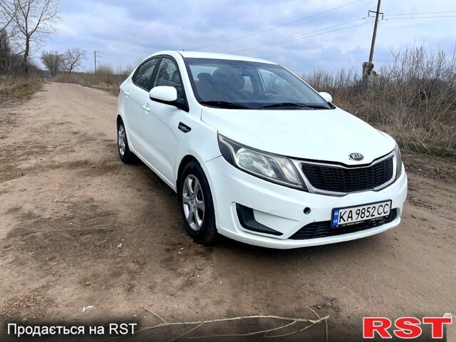 Белый Киа Рио, объемом двигателя 1.4 л и пробегом 210 тыс. км за 5500 $, фото 1 на Automoto.ua