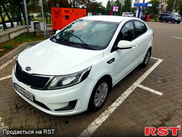 Белый Киа Рио, объемом двигателя 1.4 л и пробегом 260 тыс. км за 7000 $, фото 1 на Automoto.ua
