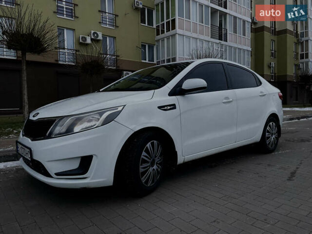 Білий Кіа Ріо, об'ємом двигуна 1.4 л та пробігом 210 тис. км за 6050 $, фото 1 на Automoto.ua