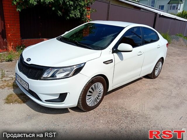Білий Кіа Ріо, об'ємом двигуна 1.4 л та пробігом 213 тис. км за 7800 $, фото 1 на Automoto.ua
