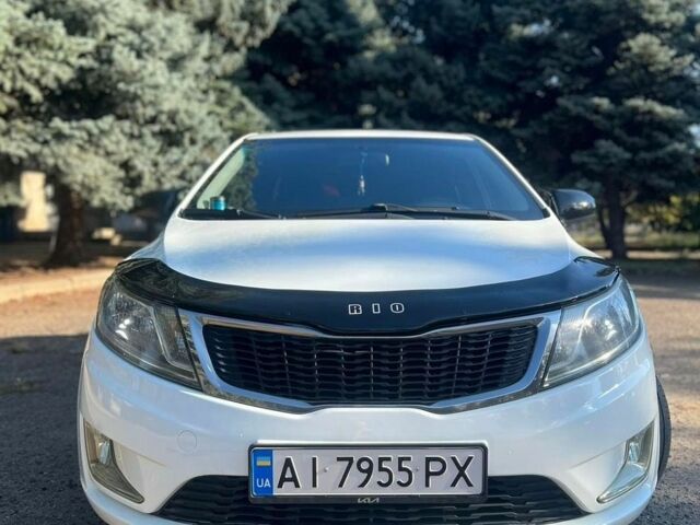Белый Киа Рио, объемом двигателя 1.4 л и пробегом 220 тыс. км за 7400 $, фото 1 на Automoto.ua