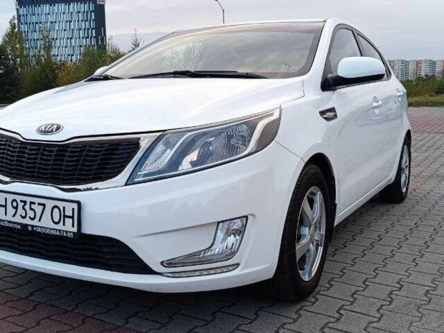 Білий Кіа Ріо, об'ємом двигуна 1.4 л та пробігом 99 тис. км за 9000 $, фото 1 на Automoto.ua