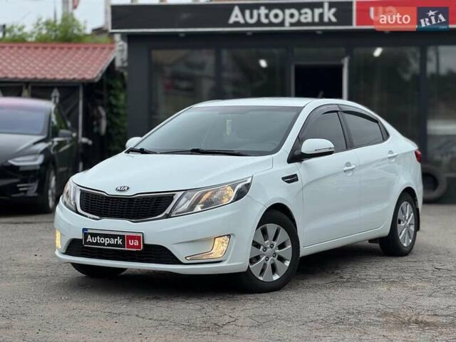 Белый Киа Рио, объемом двигателя 1.6 л и пробегом 105 тыс. км за 7790 $, фото 1 на Automoto.ua