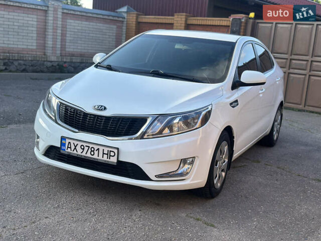 Белый Киа Рио, объемом двигателя 1.4 л и пробегом 145 тыс. км за 6500 $, фото 1 на Automoto.ua