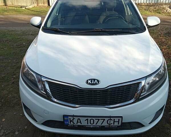 Білий Кіа Ріо, об'ємом двигуна 1.4 л та пробігом 87 тис. км за 8000 $, фото 1 на Automoto.ua