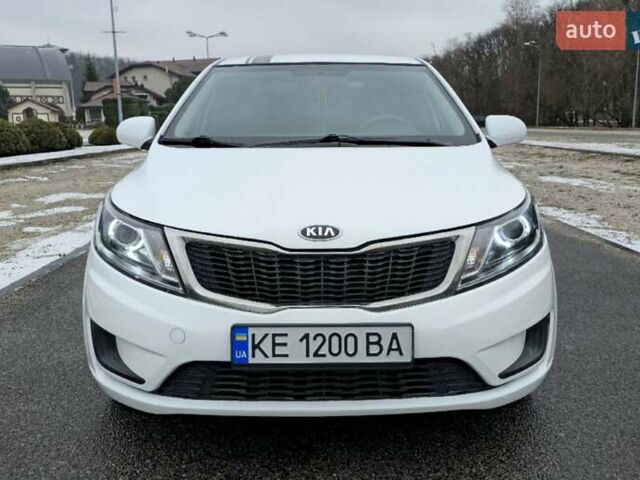Білий Кіа Ріо, об'ємом двигуна 1.4 л та пробігом 124 тис. км за 7199 $, фото 1 на Automoto.ua