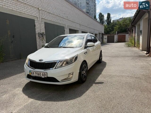 Белый Киа Рио, объемом двигателя 1.4 л и пробегом 143 тыс. км за 9199 $, фото 1 на Automoto.ua