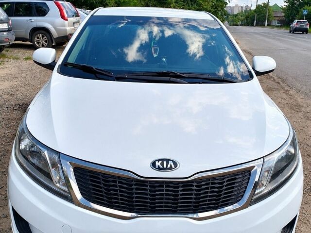 Білий Кіа Ріо, об'ємом двигуна 1.4 л та пробігом 84 тис. км за 8200 $, фото 1 на Automoto.ua