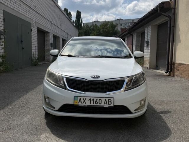 Белый Киа Рио, объемом двигателя 1.4 л и пробегом 143 тыс. км за 8917 $, фото 1 на Automoto.ua
