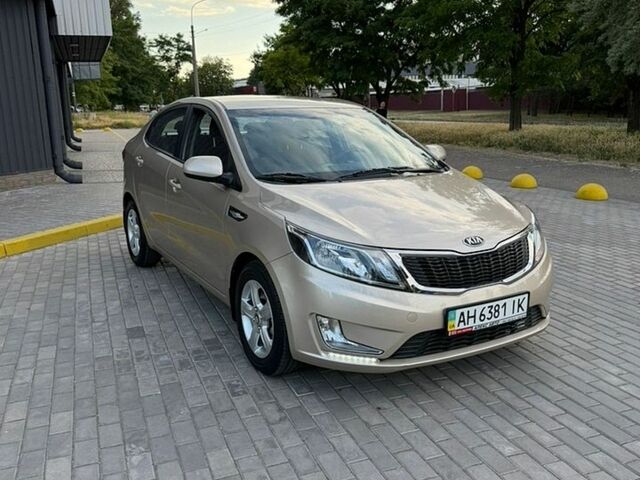 Бежевый Киа Рио, объемом двигателя 1.4 л и пробегом 13 тыс. км за 9800 $, фото 1 на Automoto.ua