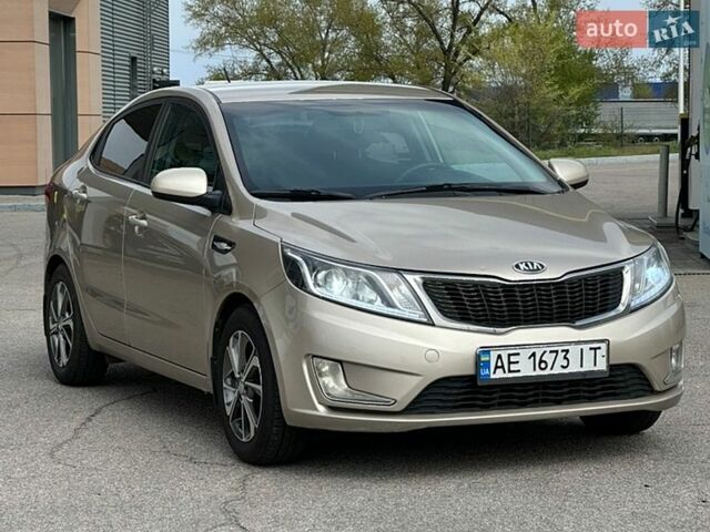 Бежевый Киа Рио, объемом двигателя 1.4 л и пробегом 217 тыс. км за 8299 $, фото 1 на Automoto.ua