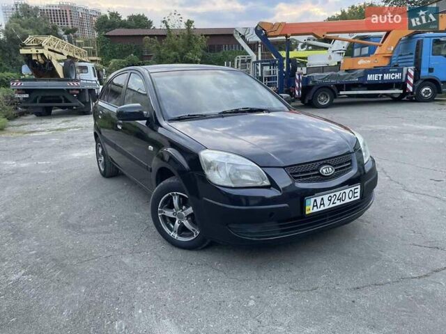 Черный Киа Рио, объемом двигателя 1.4 л и пробегом 265 тыс. км за 3900 $, фото 1 на Automoto.ua