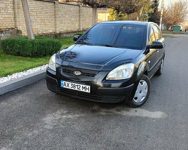 Черный Киа Рио, объемом двигателя 1.4 л и пробегом 297 тыс. км за 4500 $, фото 1 на Automoto.ua