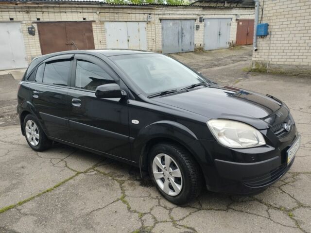 Черный Киа Рио, объемом двигателя 1.4 л и пробегом 110 тыс. км за 6156 $, фото 1 на Automoto.ua