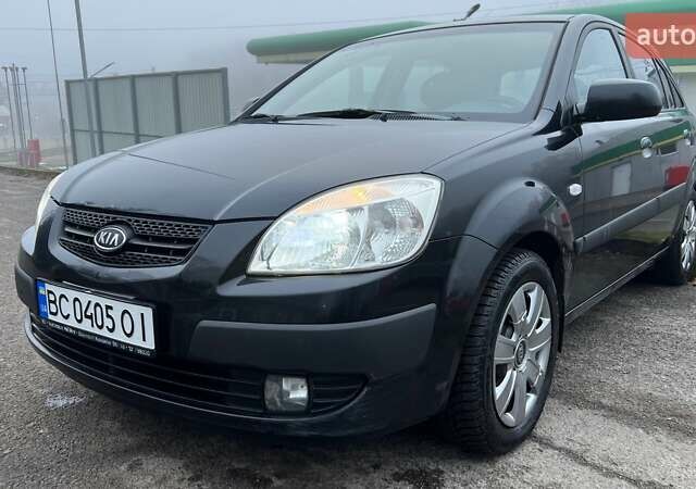 Черный Киа Рио, объемом двигателя 1.6 л и пробегом 230 тыс. км за 4900 $, фото 1 на Automoto.ua