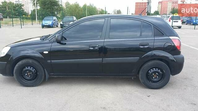 Черный Киа Рио, объемом двигателя 1.4 л и пробегом 144 тыс. км за 4600 $, фото 1 на Automoto.ua