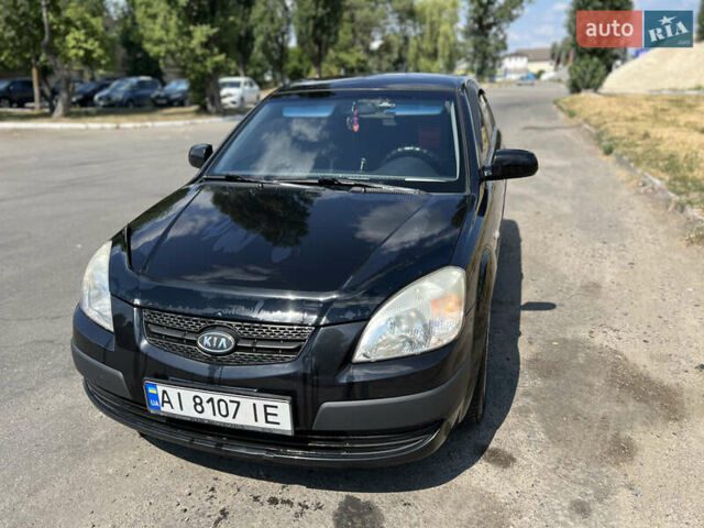 Черный Киа Рио, объемом двигателя 1.4 л и пробегом 293 тыс. км за 3970 $, фото 1 на Automoto.ua