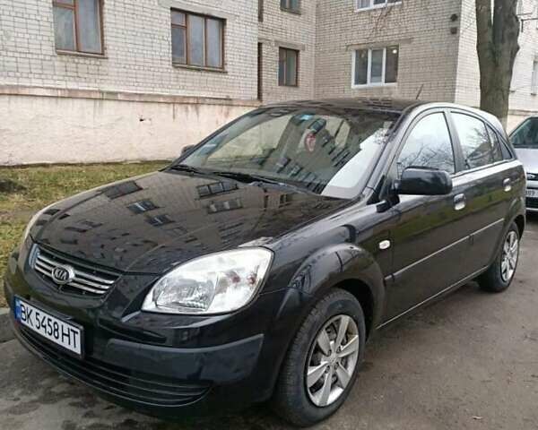 Черный Киа Рио, объемом двигателя 1.4 л и пробегом 201 тыс. км за 4200 $, фото 1 на Automoto.ua