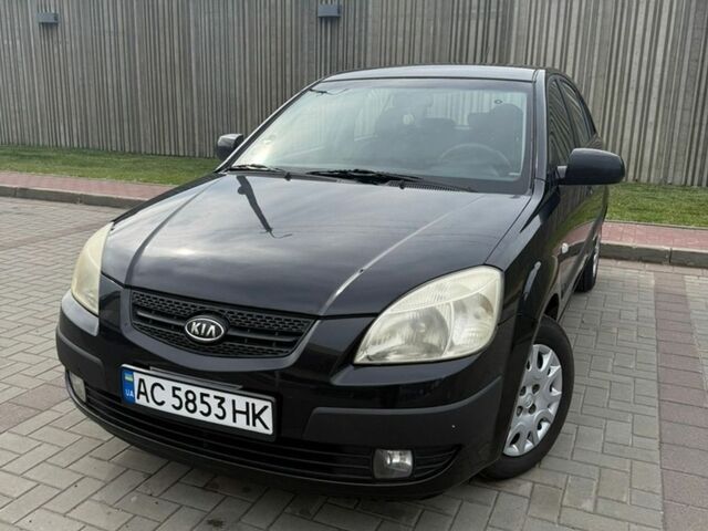 Черный Киа Рио, объемом двигателя 1.4 л и пробегом 230 тыс. км за 4400 $, фото 1 на Automoto.ua