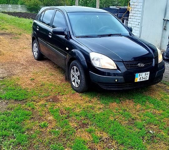 Черный Киа Рио, объемом двигателя 1.4 л и пробегом 160 тыс. км за 4500 $, фото 1 на Automoto.ua