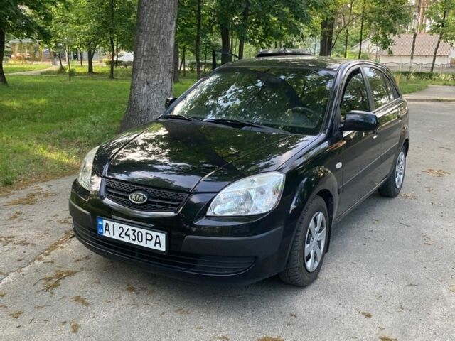 Чорний Кіа Ріо, об'ємом двигуна 1.4 л та пробігом 227 тис. км за 4800 $, фото 1 на Automoto.ua