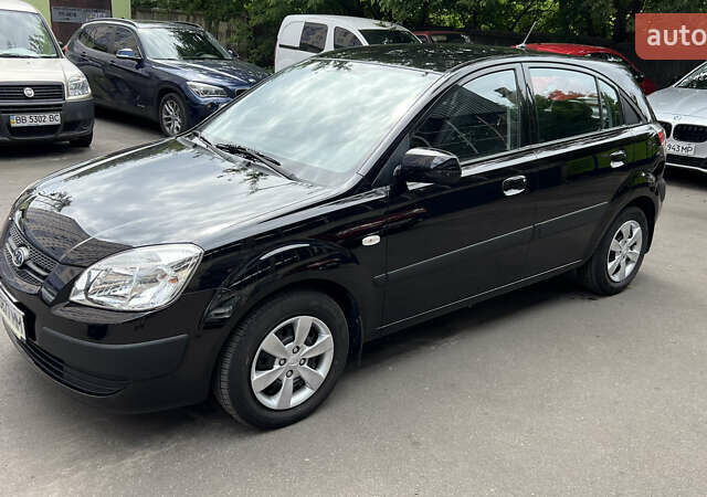 Черный Киа Рио, объемом двигателя 1.4 л и пробегом 108 тыс. км за 6700 $, фото 1 на Automoto.ua