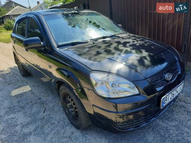 Черный Киа Рио, объемом двигателя 1.4 л и пробегом 390 тыс. км за 3500 $, фото 1 на Automoto.ua