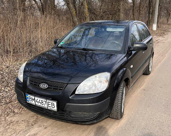 Черный Киа Рио, объемом двигателя 1.4 л и пробегом 194 тыс. км за 4900 $, фото 1 на Automoto.ua
