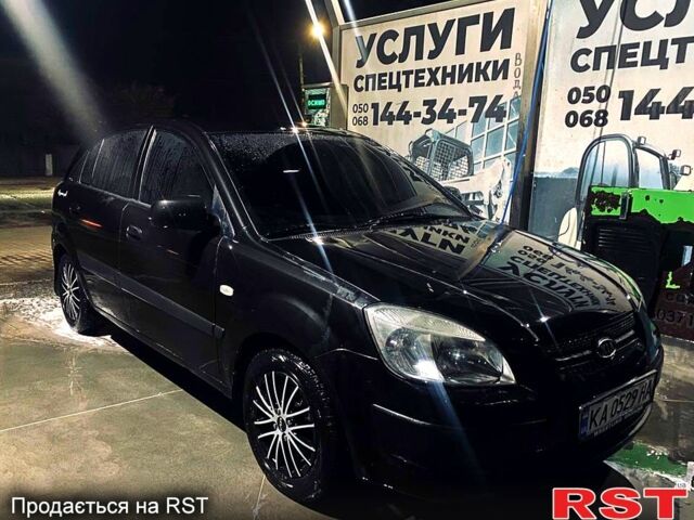 Черный Киа Рио, объемом двигателя 1.4 л и пробегом 205 тыс. км за 5000 $, фото 1 на Automoto.ua