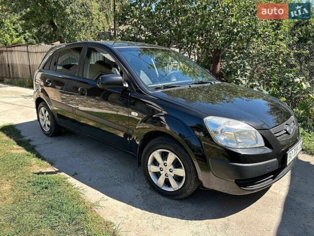 Черный Киа Рио, объемом двигателя 1.4 л и пробегом 214 тыс. км за 5100 $, фото 1 на Automoto.ua
