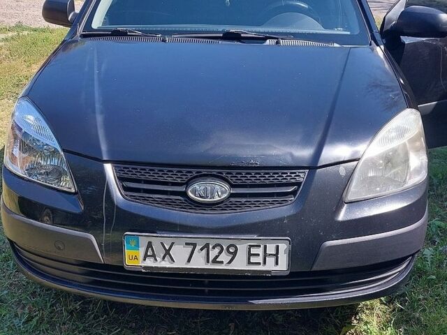 Чорний Кіа Ріо, об'ємом двигуна 1.4 л та пробігом 235 тис. км за 3300 $, фото 1 на Automoto.ua